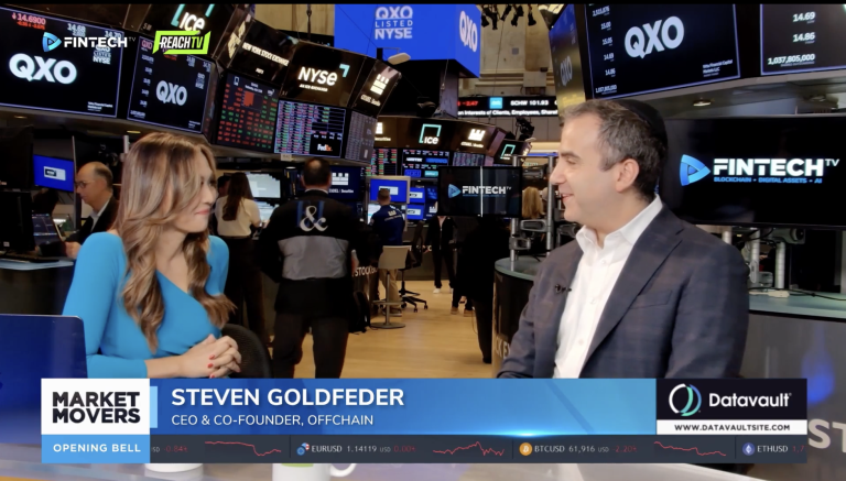 Steven Goldfeder speaks with a FINTECH.TV host on the New York Stock Exchange floor, with Market Movers and Opening Bell graphics on screen.