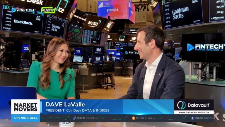 Dave LaValle speaks with a Market Movers host on the NYSE floor, with FINTECH.TV screens and market data behind them.