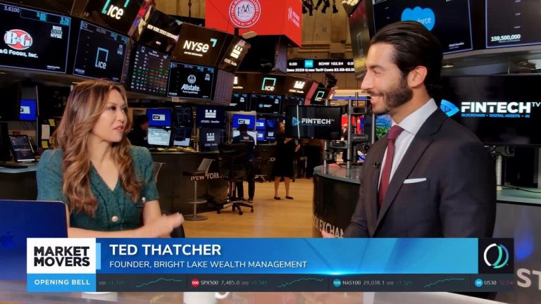 Ted Thatcher speaks with a presenter on the FINTECH.TV Market Movers set amid NYSE trading screens.