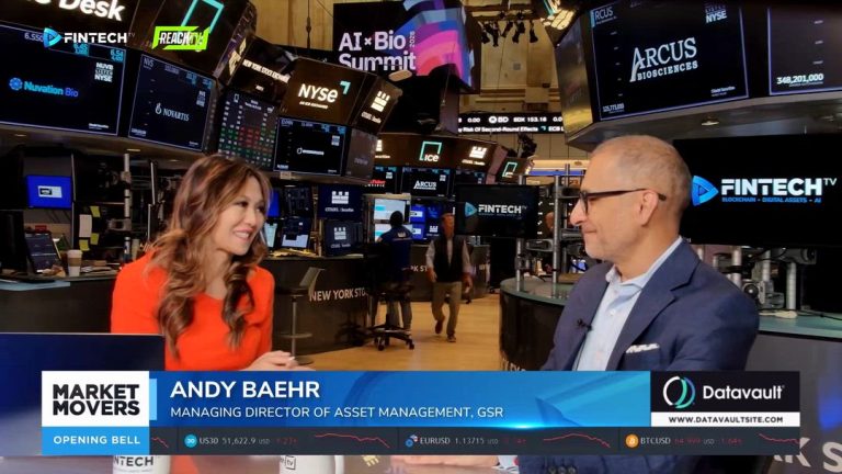 A FINTECH.TV Market Movers segment shows Andy Baehr speaking with a woman on the New York Stock Exchange floor.