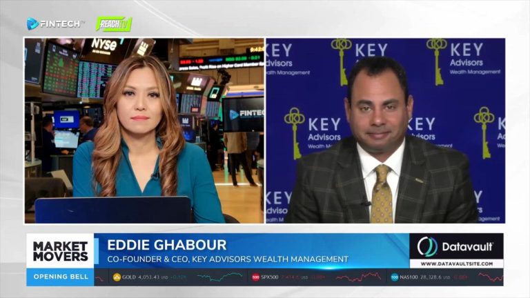 Split-screen FINTECH.TV interview with Eddie Ghabour beside a Market Movers host on the New York Stock Exchange floor.