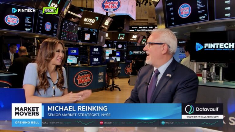 Michael Reinking speaks during a Market Movers interview at the NYSE opening bell with trading screens in the background.