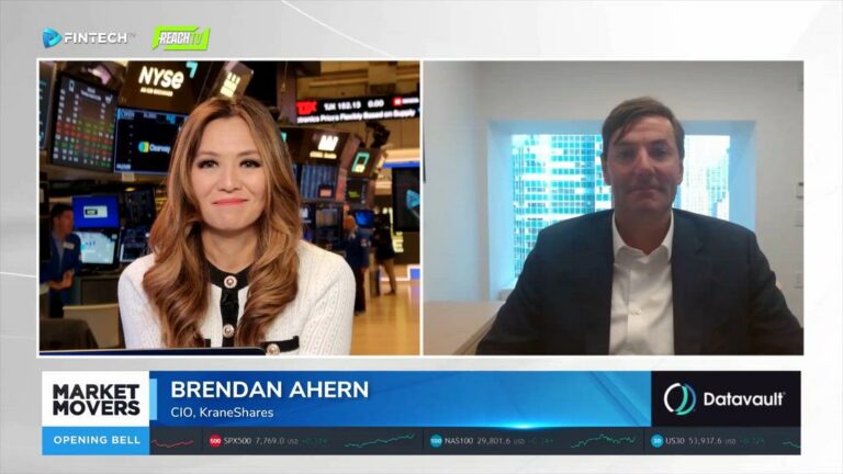 A FINTECH.TV Market Movers interview shows Brendan Ahern in a navy blazer beside the host on the NYSE trading floor.
